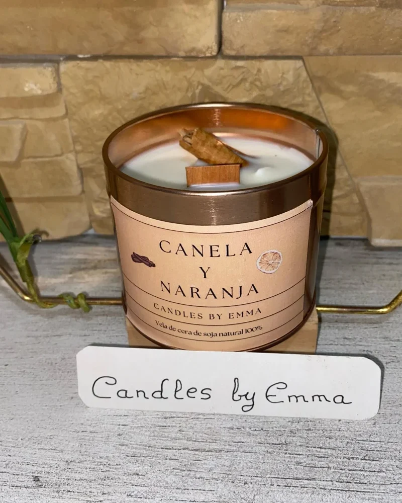 Vela aromática canela y naranja decorada